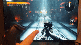 Interactive latency: a GIF showing the delay between a controller button press and the on-screen response.